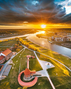 Aerial view of landscape against sky during sunset