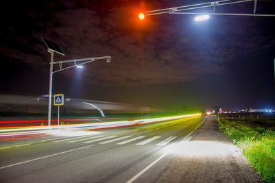 Light trails on road at night