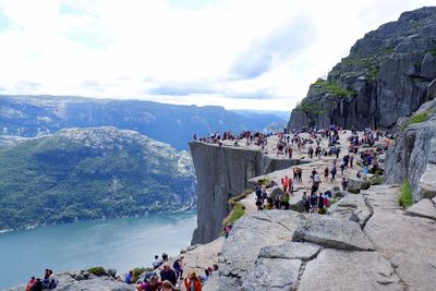 Tourists at preikestolen, the pulpit rock, norway