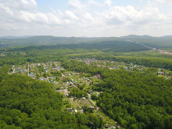 High angle view of trees on landscape against sky