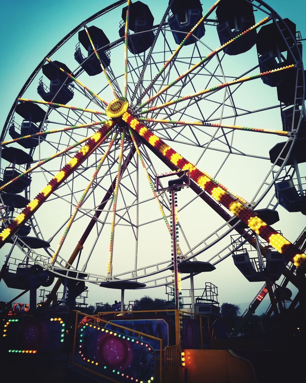 FERRIS WHEEL AGAINST SKY