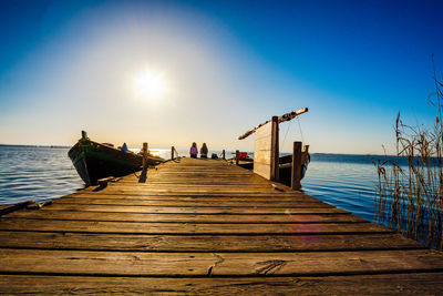 Pier over sea against sky