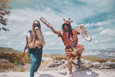 Representation of inca warrior dressed and with battle, prehispanic fighting with a tourist in peru