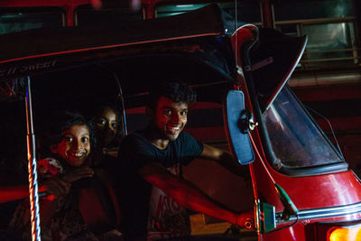 Portrait of man sitting in car