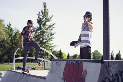 Young skateboarders on ramp