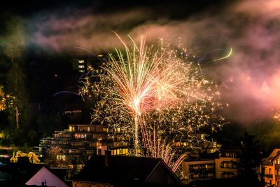 Firework display at night