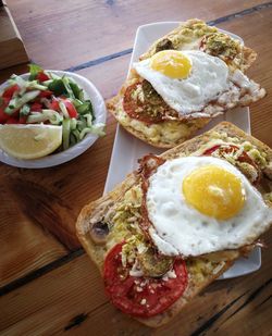 High angle view of breakfast served on table