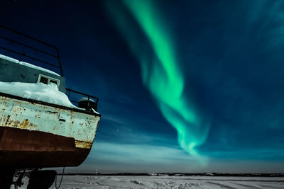 Scenic view of dramatic sky during winter
