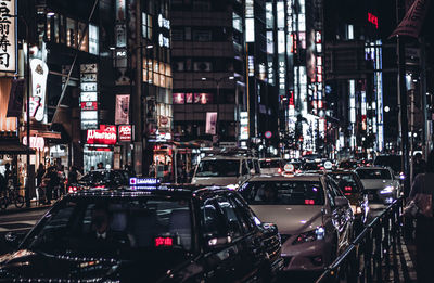 Cars on road at night