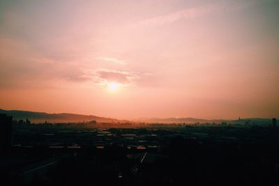 Scenic view of landscape at sunset