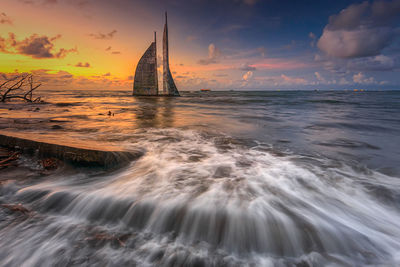 Scenic view of sea against sky during sunset