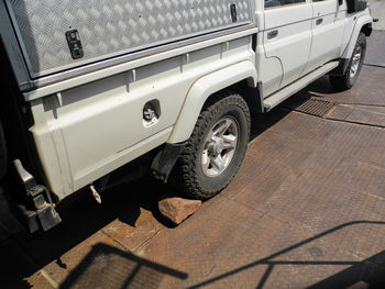 Off road vehicle loading on a ferry at lake kariba lake in zimbabwe south africa