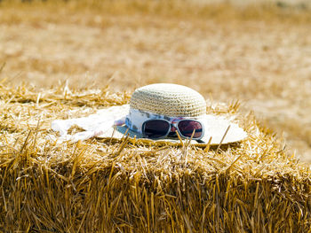 Close-up of sunglasses on grass