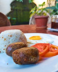 Close-up of breakfast served on table