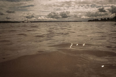 Surface level of sea against sky