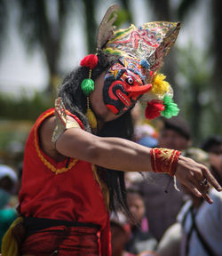 Man wearing costume during traditional festival
