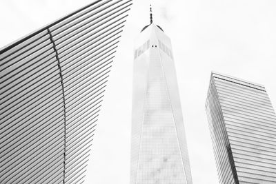 Low angle view of buildings in city against sky