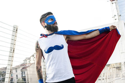 Young hipster superhero fights evil