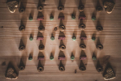 High angle view of colored pencils on wooden table