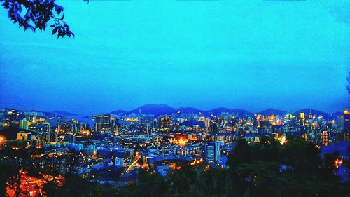 Illuminated cityscape at night