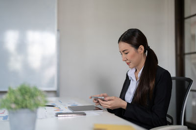 Businesswoman working at office