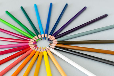 High angle view of multi colored pencils on table