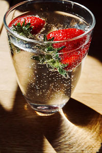 Close-up of cocktail in glass on table