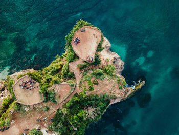 High angle view of cliff in sea