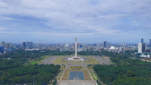 High angle view of national monument against sky at jakarta, indonesia