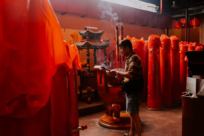 Rear view of people in temple