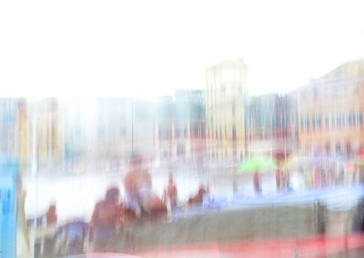 Blurred motion of buildings against clear sky