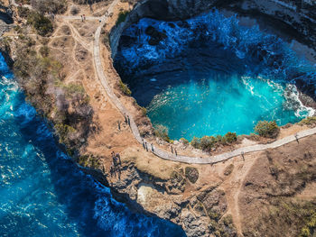 High angle view of rocks by swimming pool