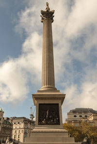 Low angle view of statue against sky