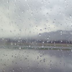 Close-up of water drops on glass