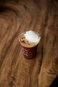 High angle view of coffee cup on table