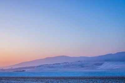 Scenic view of mountains against clear sky