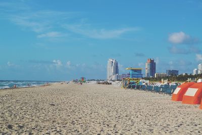 Panoramic view of beach against sky in city