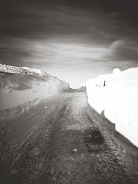 Scenic view of snow covered mountain against sky