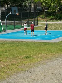 People playing on grassland