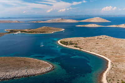 Sailing boat at anchor in the kornati archipelago, drone view