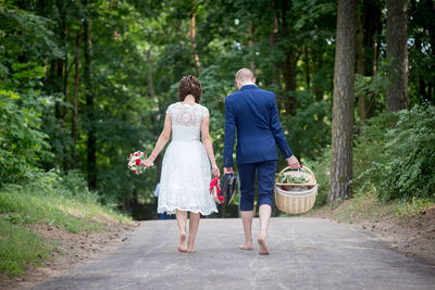 Rear view of women walking in park