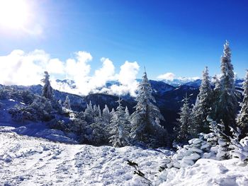 Scenic view of mountains against sky during winter