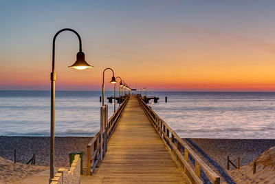 Long pier at the german baltic sea coast before sunrise