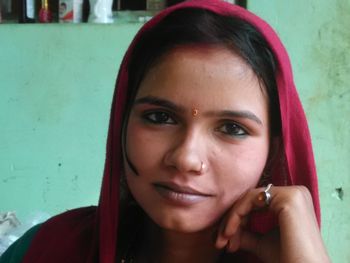 Close-up portrait of a smiling young woman