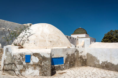 View of historical building against clear blue sky