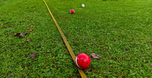 High angle view of red ball on field