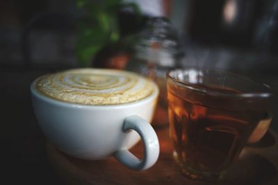 Close-up of cappuccino on table