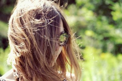 Close-up of woman wearing sunglasses