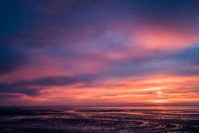 Scenic view of sea at sunset