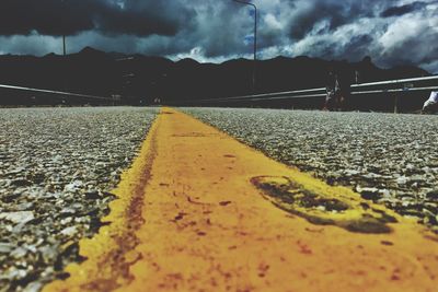 Surface level of road against mountain range